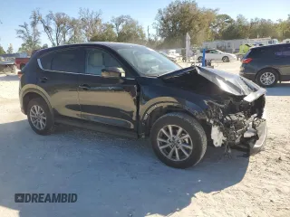 2023 Mazda CX-5 S Select with VIN JM3KFBBM2P0237142, listed as a Copart auction lot 47841235 with 16,911 mi miles and Salvage Title. Bid and sale history available at DreamBid. Image 4.