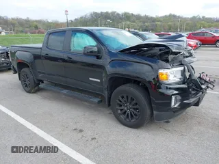2021 GMC Canyon 4WD Elevation z VIN 1GTG6CEN2M1257244, wystawiony jako IAAI lot #42007116 z przebiegiem 24 874 mil mil oraz . Historia ofert i sprzedaży dostępna na DreamBid. Obrazek 1.