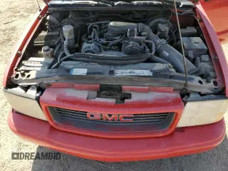 2000 GMC Sonoma SLS z VIN 1GTCS19W0Y8262960, wystawiony jako Copart lot #56512435 z przebiegiem 243 662 mil mil oraz Tytuł czysty. Historia ofert i sprzedaży dostępna na DreamBid. Obrazek 11.