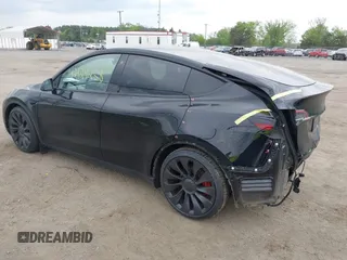 2023 Tesla Model Y Performance z VIN 7SAYGDEF7PF663387, wystawiony jako IAAI lot #42129258 z przebiegiem 42 691 mil mil oraz . Historia ofert i sprzedaży dostępna na DreamBid. Obrazek 3.