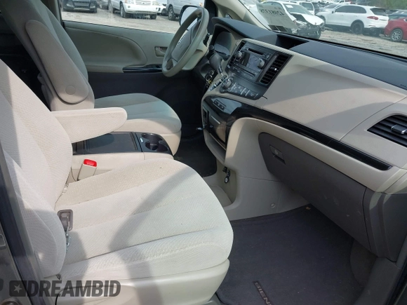 2014 Toyota Sienna LE AAS with VIN 5TDKK3DC8ES432364, listed as a IAAI auction lot 42081378 with 187,131 mi miles and . Bid and sale history available at DreamBid. Image 5.