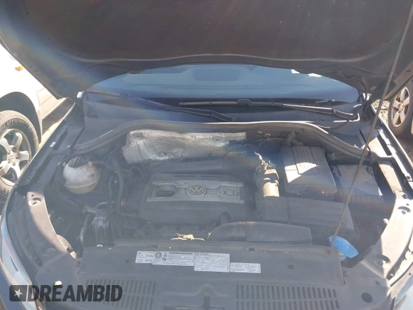 2012 Volkswagen Tiguan SE with VIN WVGAV7AX5CW000275, listed as a IAAI auction lot 41789246 with 123,618 mi miles and . Bid and sale history available at DreamBid. Image 10.