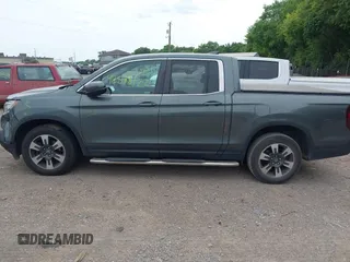 2018 Honda Ridgeline RTL-T with VIN 5FPYK3F61JB013733, listed as a IAAI auction lot 42548122 with 92,407 mi miles and . Bid and sale history available at DreamBid. Image 14.