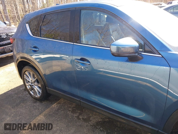 2020 Mazda CX-5 Grand Touring with VIN JM3KFBDM9L0756826, listed as a IAAI auction lot 41866290 with 145,567 mi miles. Bid and sale history available at carsss.com. Image 13.