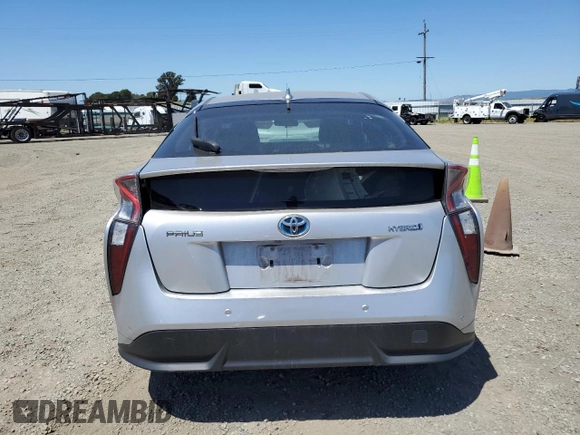 2018 Toyota Prius Two z VIN JTDKARFU3J3550801, wystawiony jako Copart lot #57625935 z przebiegiem 48 502 mil mil oraz Szkoda całkowita • Salvage title. Historia ofert i sprzedaży dostępna na DreamBid. Obrazek 6.