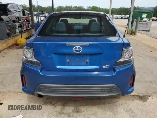 2014 Scion tC z VIN JTKJF5C76E3087992, wystawiony jako Copart lot #56058445 z przebiegiem 84 387 mil mil oraz Czysty tytuł • Clean title. Historia ofert i sprzedaży dostępna na DreamBid. Obrazek 6.