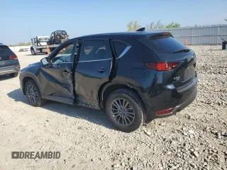 2021 Mazda CX-5 Touring z VIN JM3KFBCM5M0471172, wystawiony jako Copart lot #56646065 z przebiegiem 42 843 mil mil oraz Szkody całkowita. Historia ofert i sprzedaży dostępna na DreamBid. Obrazek 2.