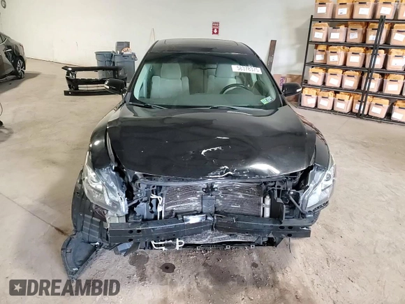 2014 Nissan Maxima SV с VIN 1N4AA5AP3EC478841, выставлен на аукционе Copart как лот 58378375 с пробегом 134 683 миль миль и Списание • Salvage title. История ставок и продаж доступна на DreamBid. Изображение 14.
