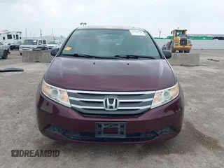 2012 Honda Odyssey EX-L with VIN 5FNRL5H61CB108301, listed as a IAAI auction lot 41939536 with 225,476 mi miles and . Bid and sale history available at DreamBid. Image 12.