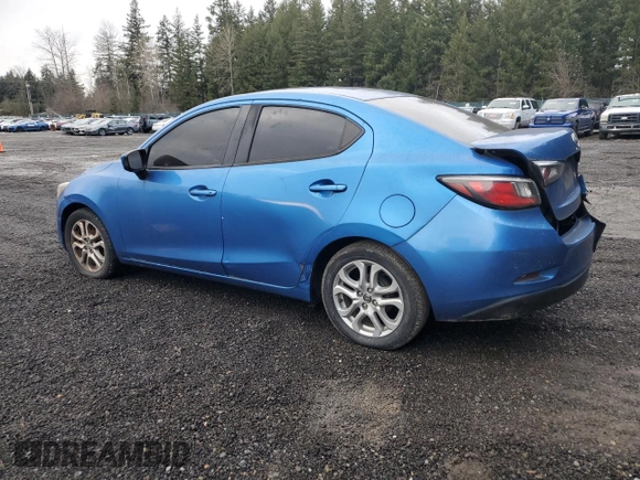 2016 Scion iA z VIN 3MYDLBZVXGY142781, wystawiony jako Copart lot #51987175 z przebiegiem 129 288 mil mil oraz Nie do naprawy • Non repairable. Historia ofert i sprzedaży dostępna na DreamBid. Obrazek 2.