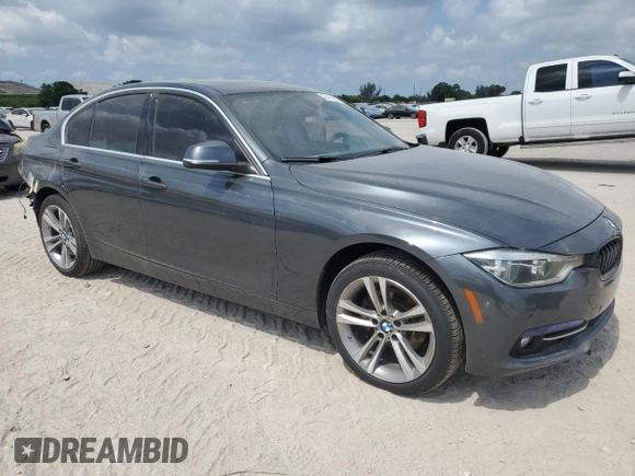 2017 BMW 3 Series 330i xDrive with VIN WBA8D9G56HNU59185, listed as a Copart auction lot 57411935 with 162,865 mi miles and Salvage title. Bid and sale history available at DreamBid. Image 4.