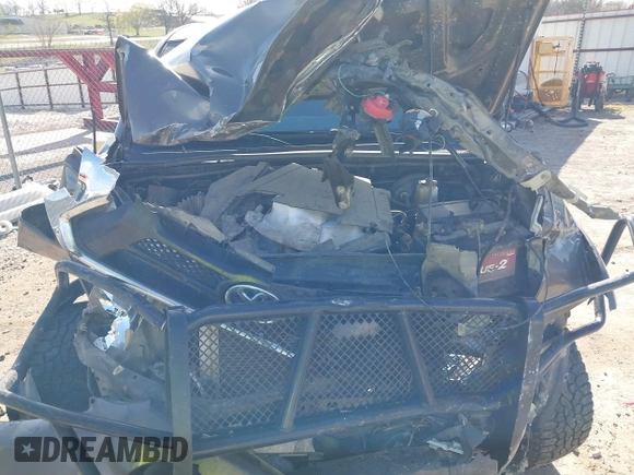 2015 Toyota Tacoma with VIN 5TFLU4ENXFX139145, listed as a IAAI auction lot 41822079 with 146,842 mi miles. Bid and sale history available at carsss.com. Image 10.