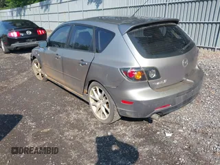 2006 Mazda 3 S Grand Touring z VIN JM1BK344561456189, wystawiony jako IAAI lot #42459158 z przebiegiem 167 794 mil mil oraz . Historia ofert i sprzedaży dostępna na DreamBid. Obrazek 3.
