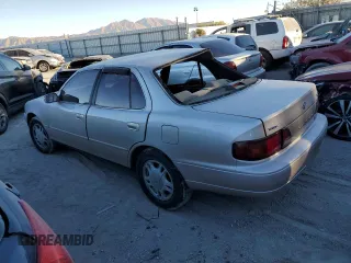 1995 Toyota Camry LE with VIN 4T1GK12E5SU76389, listed as a Copart auction lot 83120474 with 245,875 mi miles and Non Repairable. Bid and sale history available at carsss.com. Image 2.