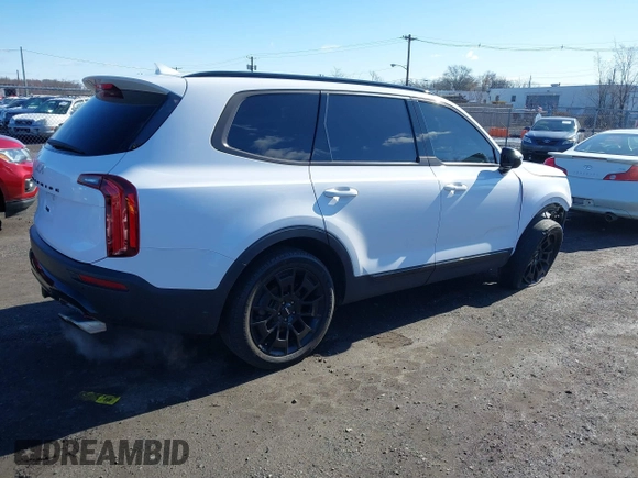 2022 Kia Telluride SX z VIN 5XYP5DHC2NG299501, wystawiony jako IAAI lot #41816830 z przebiegiem 61 413 mil mil oraz . Historia ofert i sprzedaży dostępna na DreamBid. Obrazek 4.