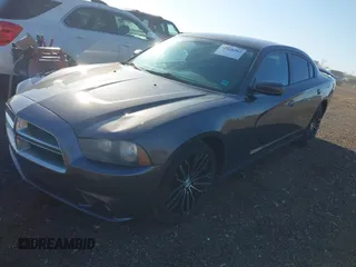 2013 Dodge Charger SXT with VIN 2C3CDXHG3DH593614, listed as a IAAI auction lot 42138282 with 174,243 mi miles. Bid and sale history available at carsss.com. Image 2.