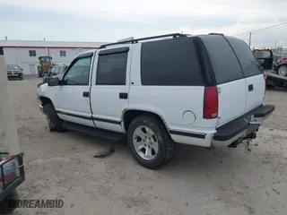 1997 Chevrolet Tahoe with VIN 1GNEK13R4VJ361515, listed as a IAAI auction lot 41768386 with 216,974 mi miles. Bid and sale history available at carsss.com. Image 3.