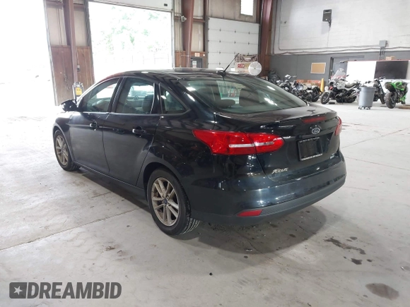 2018 Ford Focus SE with VIN 1FADP3FE8JL209560, listed as a IAAI auction lot 42707236 with 166,017 mi miles and . Bid and sale history available at DreamBid. Image 3.