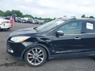 2014 Ford Escape SE with VIN 1FMCU9G94EUD84466, listed as a IAAI auction lot 42645080 with 135,535 mi miles and . Bid and sale history available at DreamBid. Image 6.