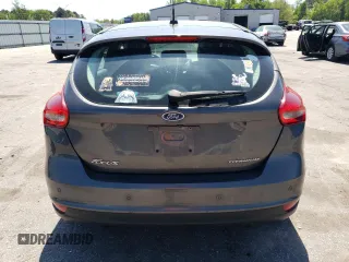 2016 Ford Focus Titanium with VIN 1FADP3N27GL201482, listed as a Copart auction lot 51768335 with 54,463 mi miles and Salvage title. Bid and sale history available at DreamBid. Image 6.