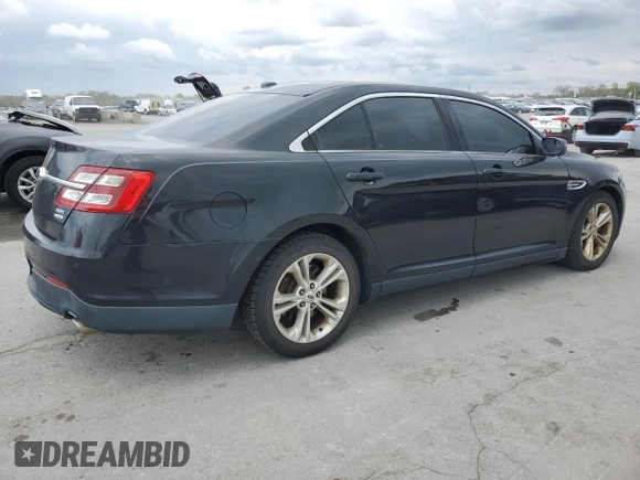 2015 Ford Taurus SEL with VIN 1FAHP2E92FG168293, listed as a Copart auction lot 52775625 with 207,447 mi miles and Salvage title. Bid and sale history available at DreamBid. Image 3.