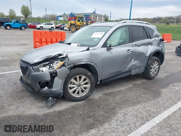 2014 Mazda CX-5 Touring with VIN JM3KE4CY1E0426409, listed as a IAAI auction lot 41924258 with 116,956 mi miles. Bid and sale history available at carsss.com. Image 2.