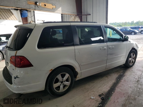 2011 Volkswagen Routan SE with VIN 2V4RW3DG7BR717718, listed as a Copart auction lot 63480915 with 271,938 mi miles and Salvage title. Bid and sale history available at DreamBid. Image 3.