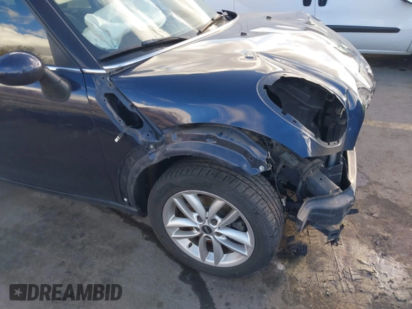 2013 MINI Countryman S with VIN WMWZC3C52DWP21475, listed as a IAAI auction lot 41215334 with 124,365 mi miles and . Bid and sale history available at DreamBid. Image 6.