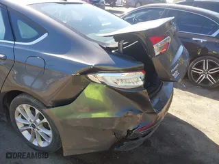 2019 Ford Fusion Hybrid SE with VIN 3FA6P0LU1KR235021, listed as a IAAI auction lot 41660786 with 93,331 mi miles. Bid and sale history available at carsss.com. Image 17.