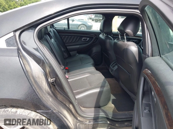2013 Ford Taurus Limited with VIN 1FAHP2F85DG229915, listed as a IAAI auction lot 42511968 with 264,676 mi miles and . Bid and sale history available at DreamBid. Image 8.