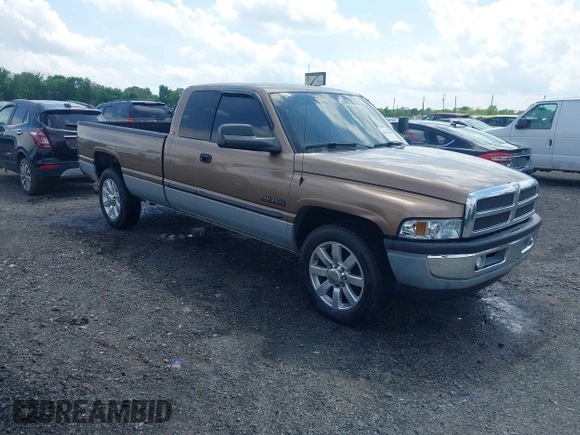 2001 Dodge 2500 with VIN 1B7KC23651J224436, listed as a IAAI auction lot 42013282 with 218,831 mi miles. Bid and sale history available at carsss.com. Image 1.