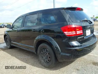 2014 Dodge Journey SE with VIN 3C4PDCAB7ET116651, listed as a IAAI auction lot 42762513 with 197,808 mi miles and . Bid and sale history available at DreamBid. Image 3.