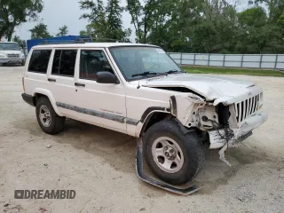 2001 Jeep Cherokee Sport with VIN 1J4FF48S31L520760, listed as a Copart auction lot 59807625 with 298,489 mi miles and Salvage title. Bid and sale history available at DreamBid. Image 4.