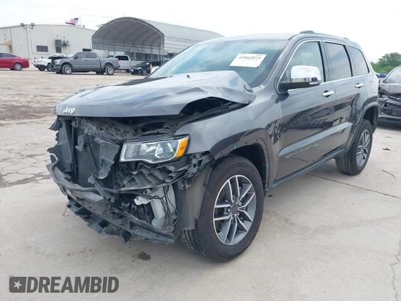 2021 Jeep Grand Cherokee 80th Anniversary with VIN 1C4RJFBG0MC504148, listed as a IAAI auction lot 42063979 with 77,941 mi miles and . Bid and sale history available at DreamBid. Image 2.
