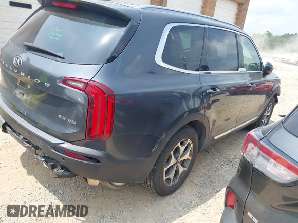 2020 Kia Telluride EX with VIN 5XYP3DHC3LG049879, listed as a IAAI auction lot 42406513 with 87,025 mi miles and . Bid and sale history available at DreamBid. Image 4.