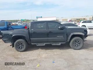 2023 Toyota Tacoma 4WD SR with VIN 3TYCZ5AN4PT170688, listed as a IAAI auction lot 41998053 with 20,770 mi miles. Bid and sale history available at carsss.com. Image 14.