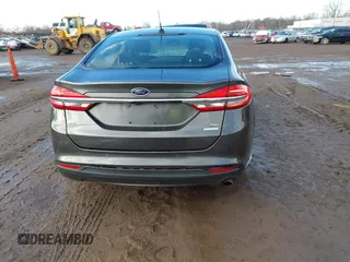 2018 Ford Fusion SE z VIN 3FA6P0HD7JR259606, wystawiony jako IAAI lot #41649797 z przebiegiem 94 094 mil mil oraz . Historia ofert i sprzedaży dostępna na DreamBid. Obrazek 16.