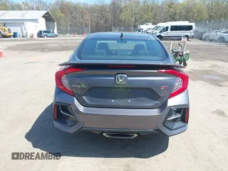2020 Honda Civic Si z VIN 2HGFC1E53LH704576, wystawiony jako IAAI lot #41979301 z przebiegiem 59 245 mil mil oraz . Historia ofert i sprzedaży dostępna na DreamBid. Obrazek 17.