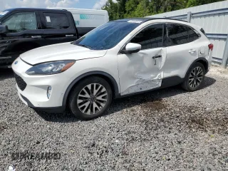 2020 Ford Escape Titanium Hybrid z VIN 1FMCU0DZ6LUA39534, wystawiony jako Copart lot #65943515 z przebiegiem 116 860 mil mil oraz Czysty tytuł • Clean title. Historia ofert i sprzedaży dostępna na DreamBid. Obrazek 1.