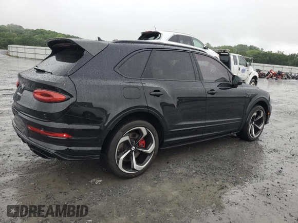 2022 Bentley Bentayga V8 z VIN SJAAM2ZV8NC039607, wystawiony jako Copart lot #54888564 z przebiegiem 15 561 mil mil oraz . Historia ofert i sprzedaży dostępna na DreamBid. Obrazek 3.