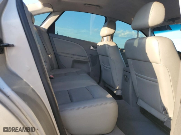 2006 Ford Five Hundred SEL with VIN 1FAFP24156G129524, listed as a Copart auction lot 73710504 with 221,311 mi miles and Salvage Title. Bid and sale history available at carsss.com. Image 10.