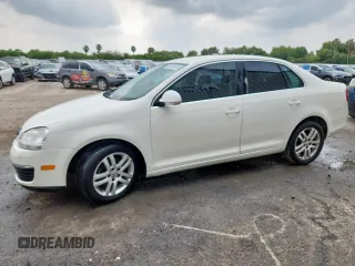 2007 Volkswagen Jetta 2.5 z VIN 3VWRF71K87M039633, wystawiony jako Copart lot #58851405 z przebiegiem 212 952 mil mil oraz Czysty tytuł • Clean title. Historia ofert i sprzedaży dostępna na DreamBid. Obrazek 1.