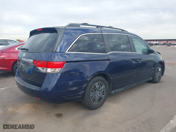2014 Honda Odyssey LX with VIN 5FNRL5H23EB013044, listed as a IAAI auction lot 41644270 with 244,271 mi miles. Bid and sale history available at carsss.com. Image 4.