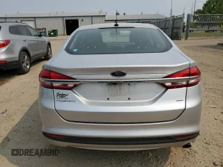 2017 Ford Fusion SE z VIN 3FA6P0H71HR389773, wystawiony jako Copart lot #58930485 z przebiegiem 135 145 mil mil oraz Czysty tytuł • Clean title. Historia ofert i sprzedaży dostępna na DreamBid. Obrazek 6.