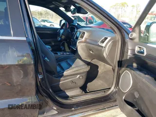 2014 Jeep Grand Cherokee Summit with VIN 1C4RJEJG1EC130727, listed as a IAAI auction lot 41269066 with 205,914 mi miles and . Bid and sale history available at DreamBid. Image 5.