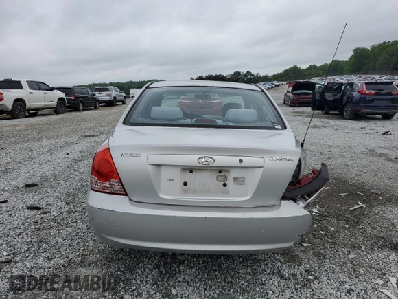 2004 Hyundai Elantra GLS z VIN KMHDN46D34U859307, wystawiony jako Copart lot #53847235 z przebiegiem 91 939 mil mil oraz Szkoda całkowita • Salvage title. Historia ofert i sprzedaży dostępna na DreamBid. Obrazek 6.