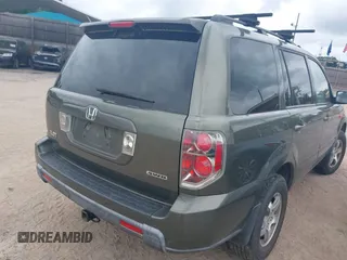 2006 Honda Pilot EX-L with VIN 5FNYF185X6B027885, listed as a IAAI auction lot 42132461 with 222,195 mi miles and . Bid and sale history available at DreamBid. Image 4.
