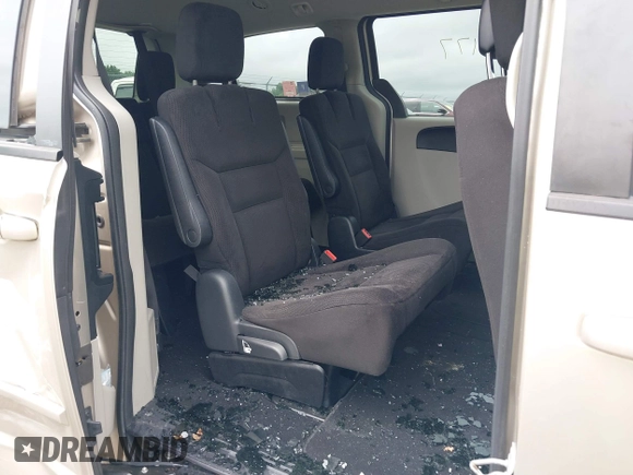 2014 Dodge Grand Caravan American Value with VIN 2C4RDGBGXER197092, listed as a IAAI auction lot 40020177 with 25,192 mi miles and . Bid and sale history available at DreamBid. Image 8.