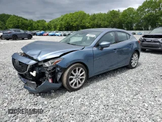 2014 Mazda 3 S Grand Touring z VIN JM1BM1M34E1165414, wystawiony jako Copart lot #58995045 z przebiegiem 145 340 mil mil oraz Czysty tytuł • Clean title. Historia ofert i sprzedaży dostępna na DreamBid. Obrazek 1.