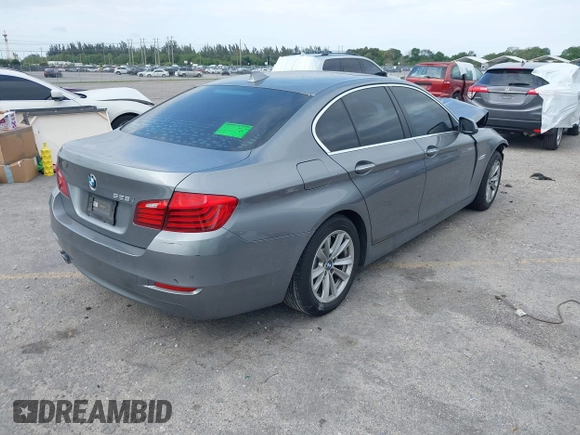 2015 BMW 5 Series 528i with VIN WBA5A5C52FD514549, listed as a IAAI auction lot 41812177 with 107,819 mi miles. Bid and sale history available at carsss.com. Image 4.